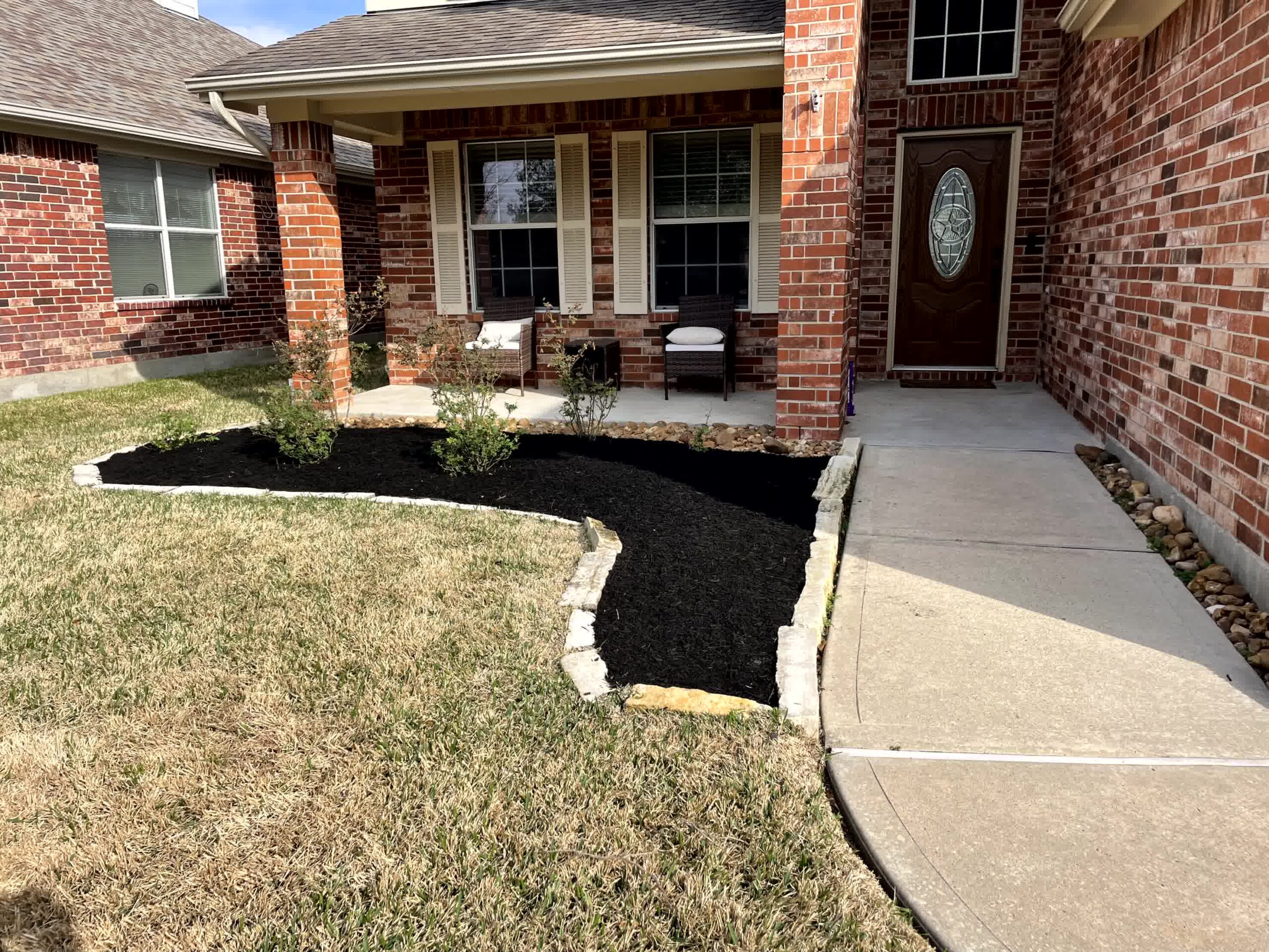 cut n edge property management atascocita Top Landscaping Projects to Prevent Weed Growth Effectively scaled -Cut'N Edge Property Management Cut’N Edge hard workers ensure rocks and mulch are installed correctly.