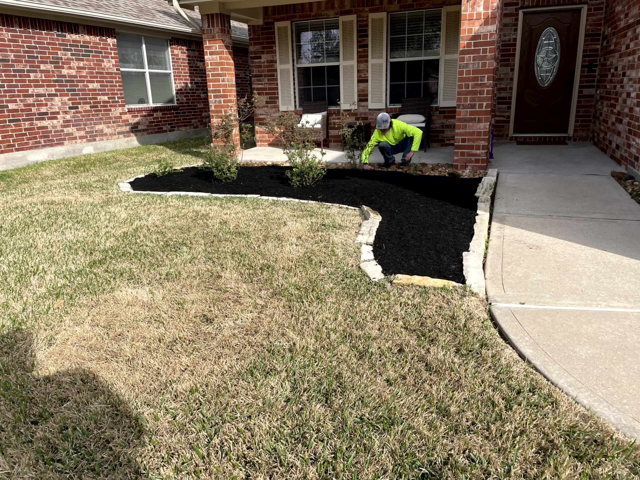 cut n edge property management humble Top Landscaping Projects to Prevent Weed Growth Effectively scaled -Cut'N Edge Property Management Rocks and mulch like this here can help keep weeds under control.